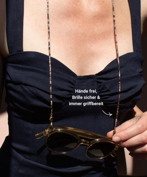 Brillenkette aus schwarzem Rhodonit & Gold