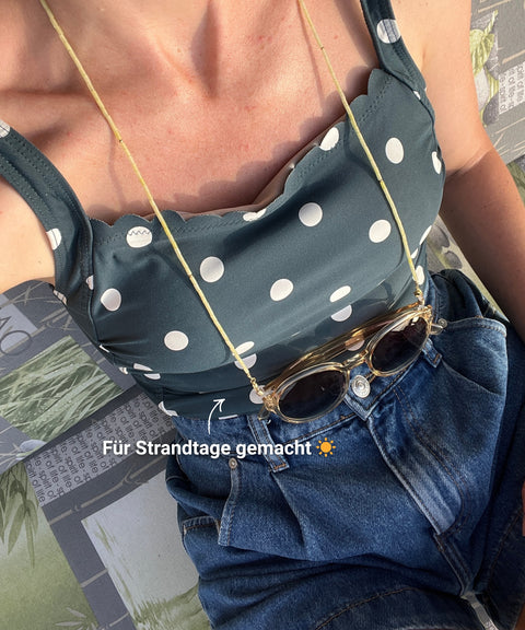 Brillenkette aus schwarzem Rhodonit & Gold